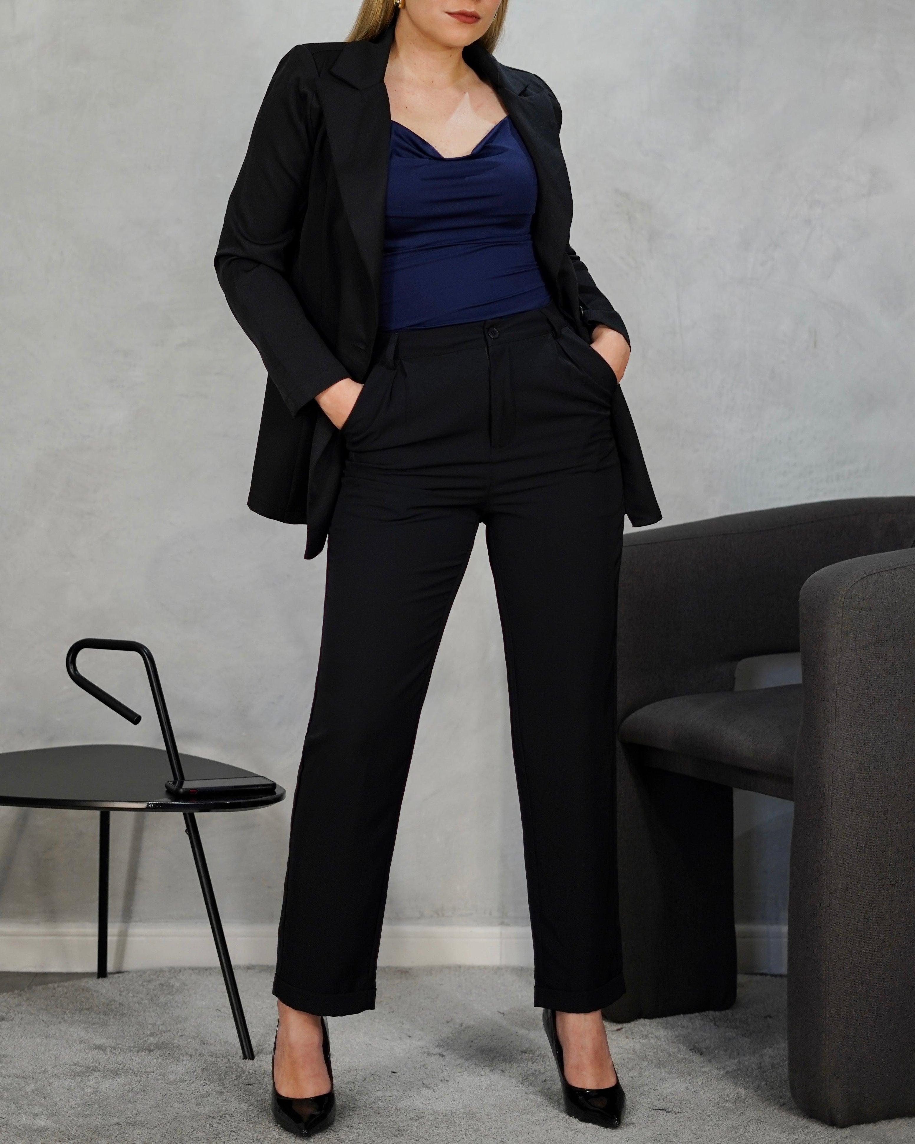 Pantalón tubo con doblés en tobillo