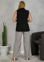 Blazer largo sin mangas con dos botones