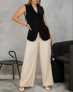 Blazer largo sin mangas con dos botones