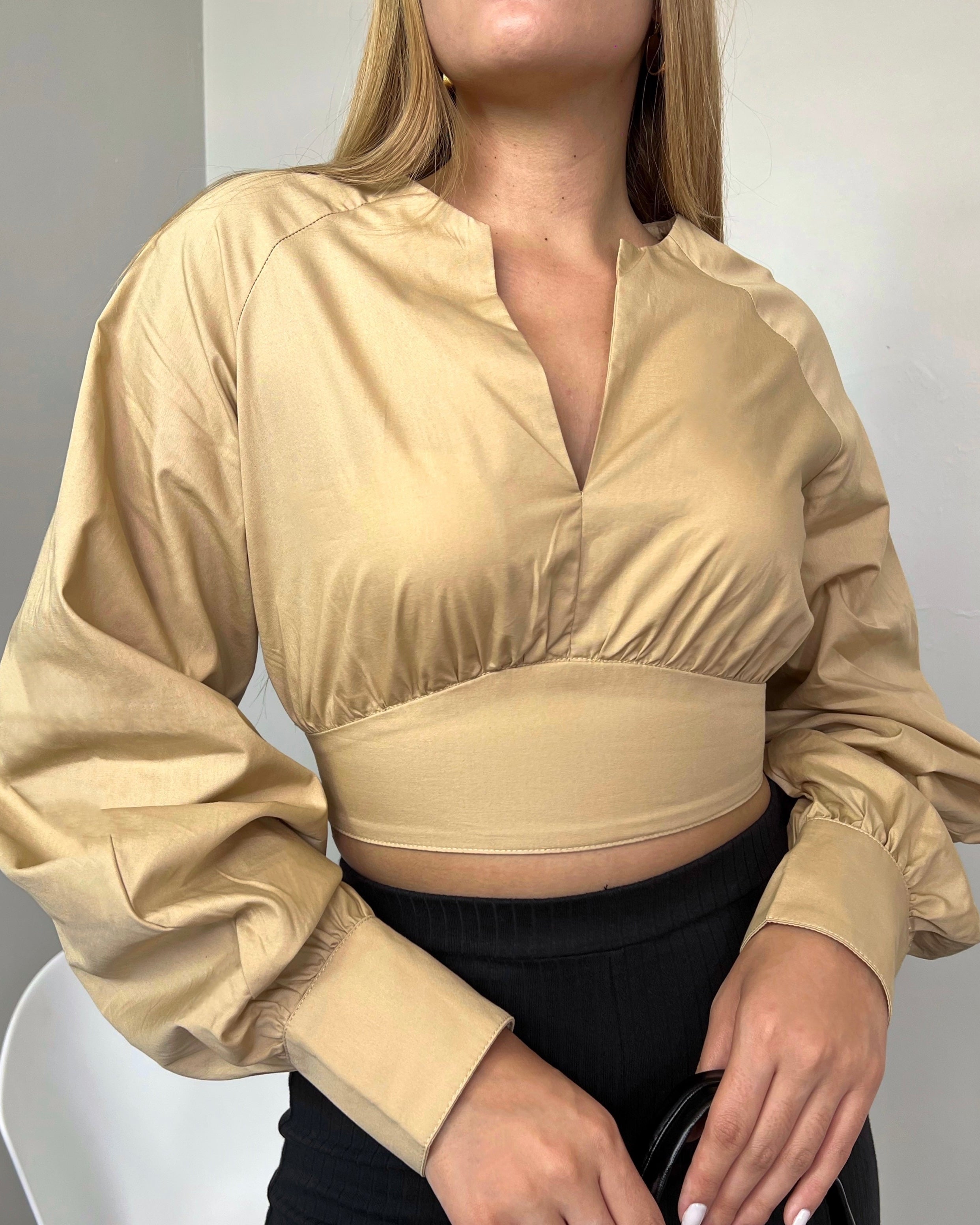 Blusa corta manga larga