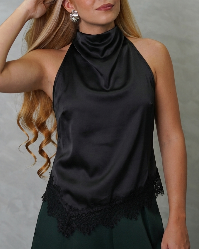Blusa asimétrica de seda con encaje en el borde inferior