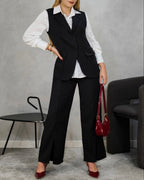 Blazer largo sin mangas con dos botones