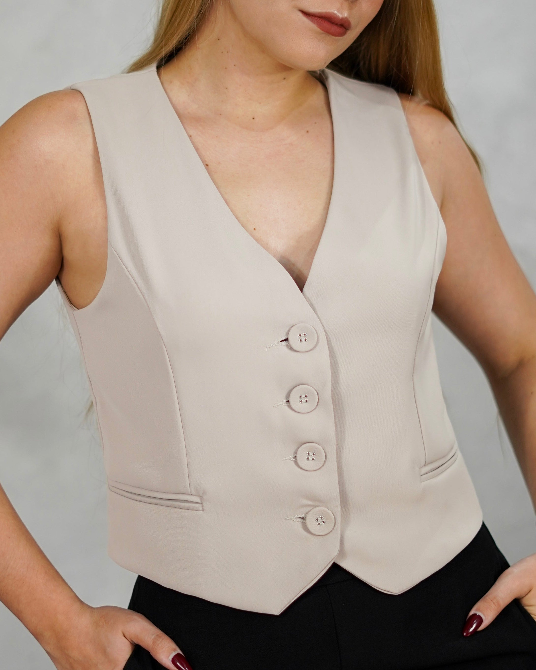 Chaleco con botones de tela