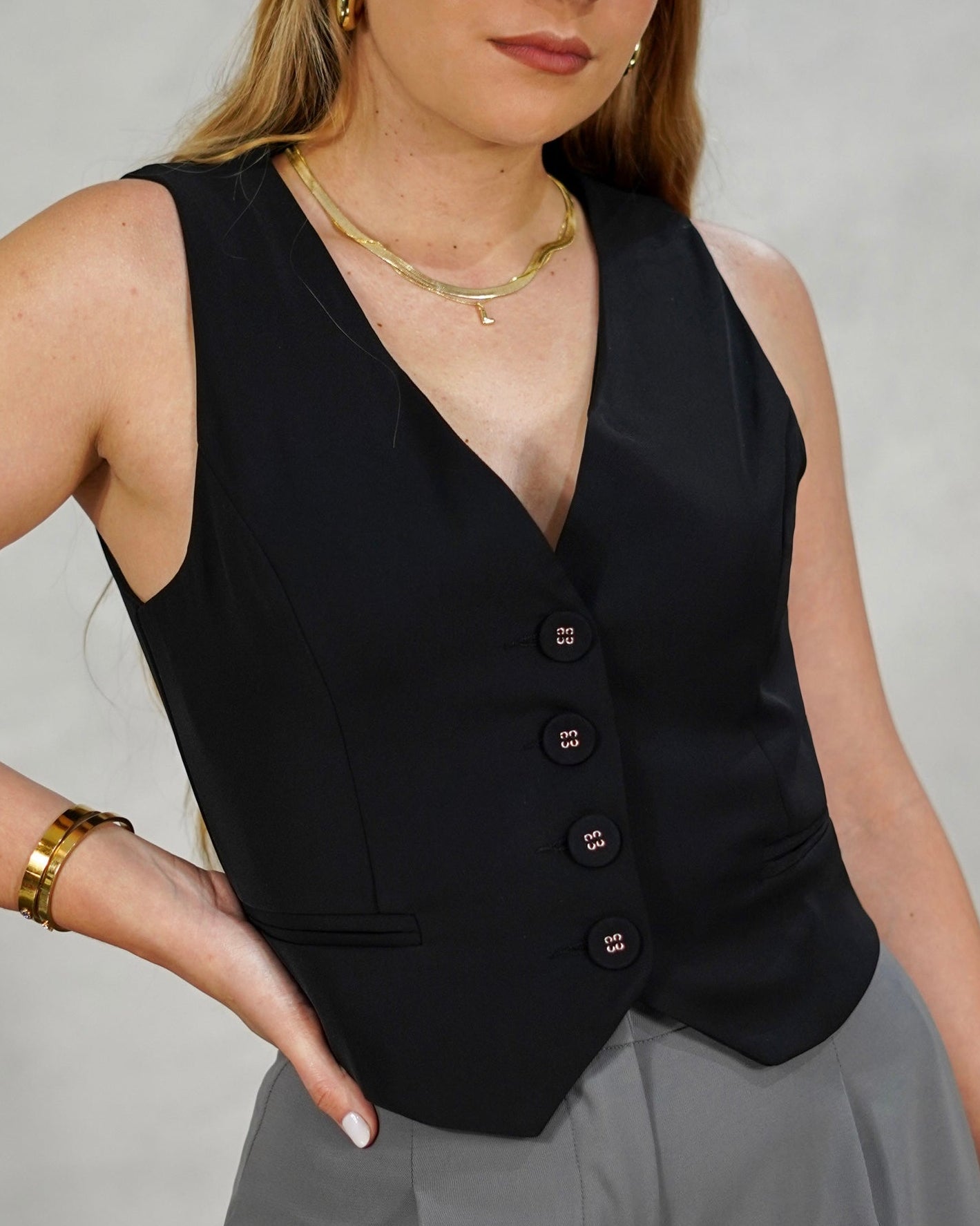 Chaleco con botones de tela