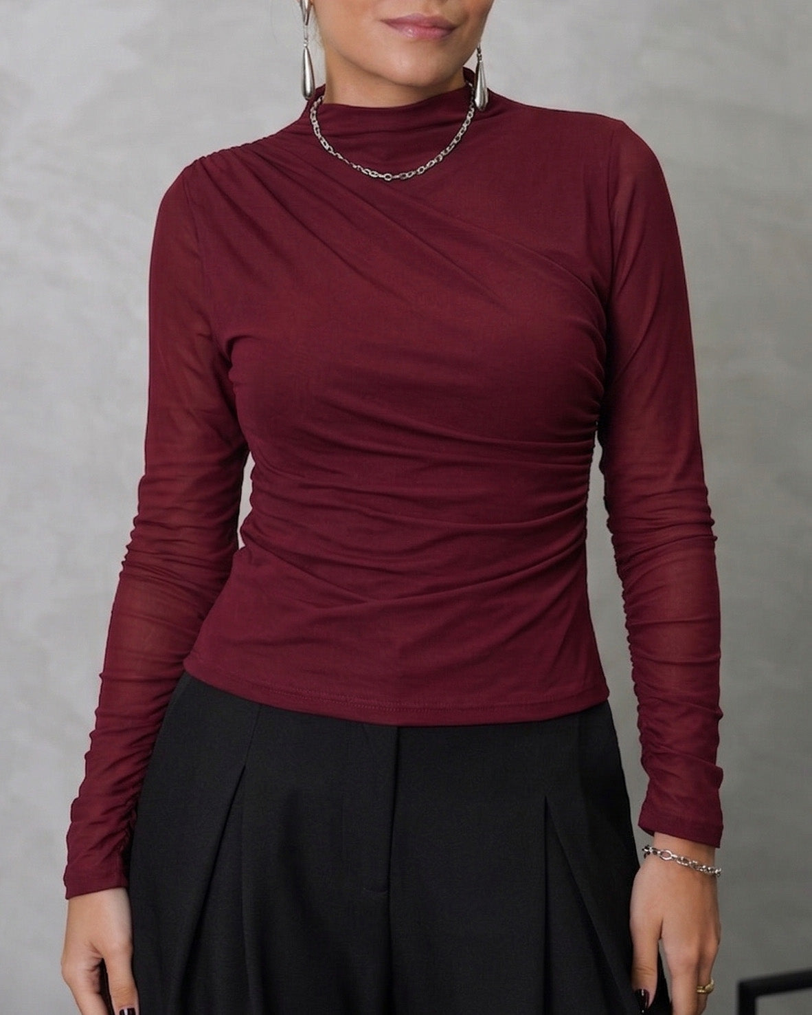 Blusa manga larga con semitransparencia