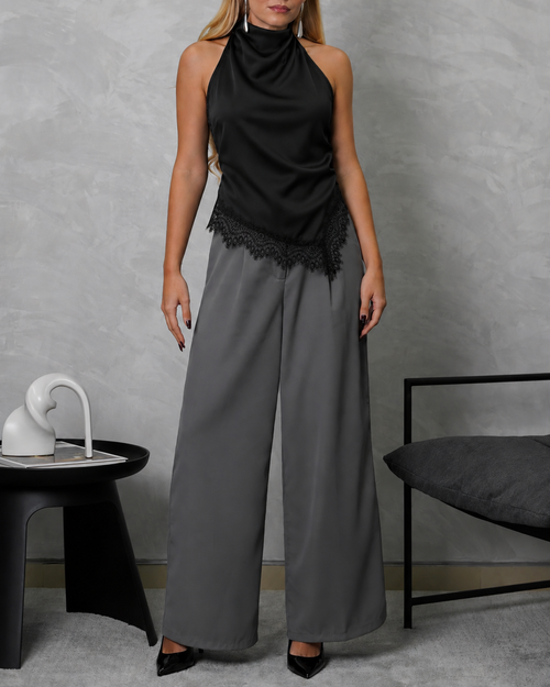 Blusa asimétrica de seda con encaje en el borde inferior
