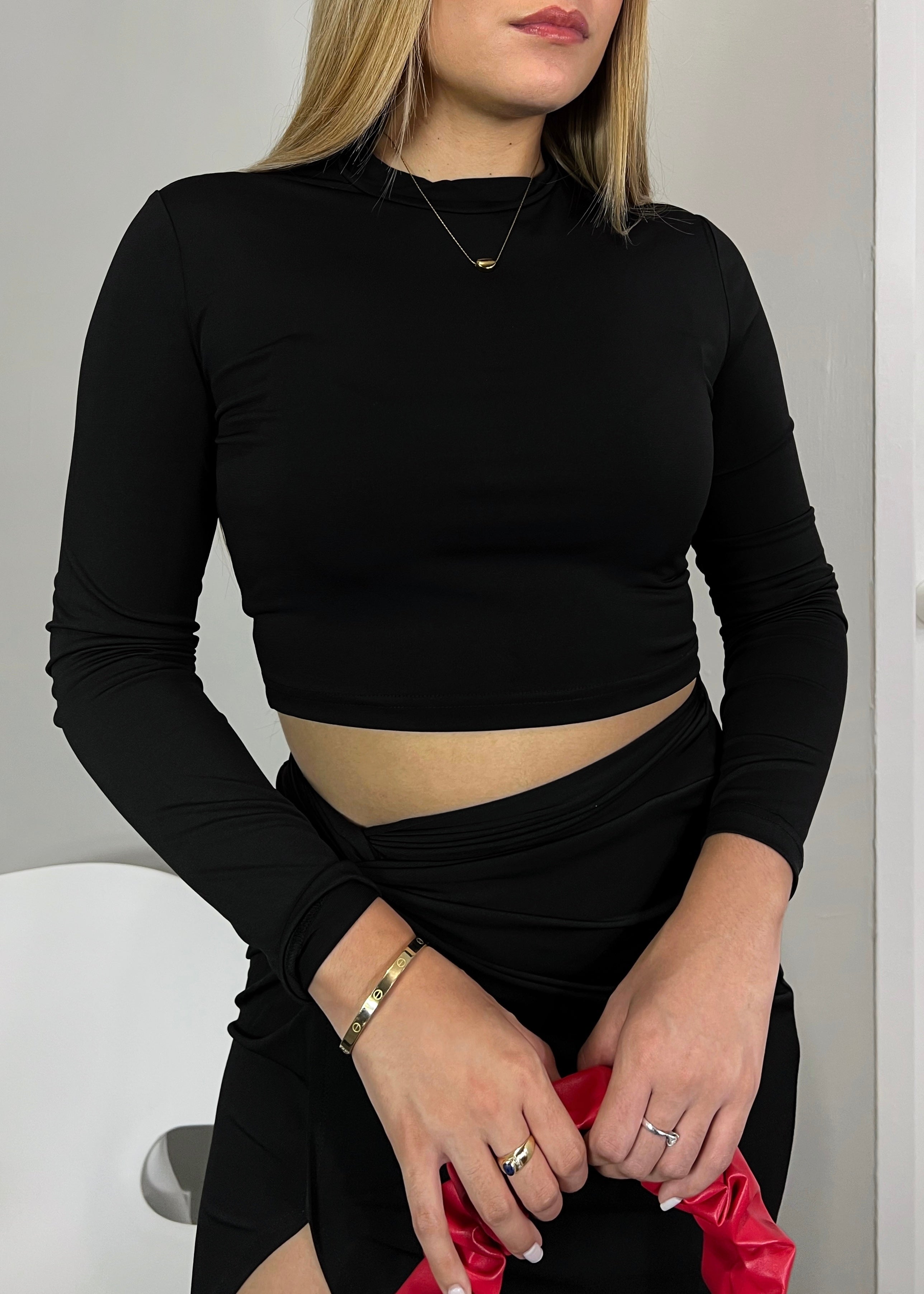 Conjunto de falda midi y top manga larga