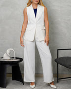 Blazer largo sin mangas con dos botones