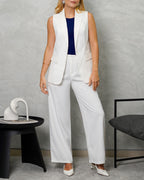 Blazer largo sin mangas con dos botones