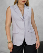 Blazer largo sin mangas con dos botones