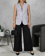 Blazer largo sin mangas con dos botones