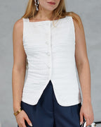 Blusa corte recto con textura y botones de perla