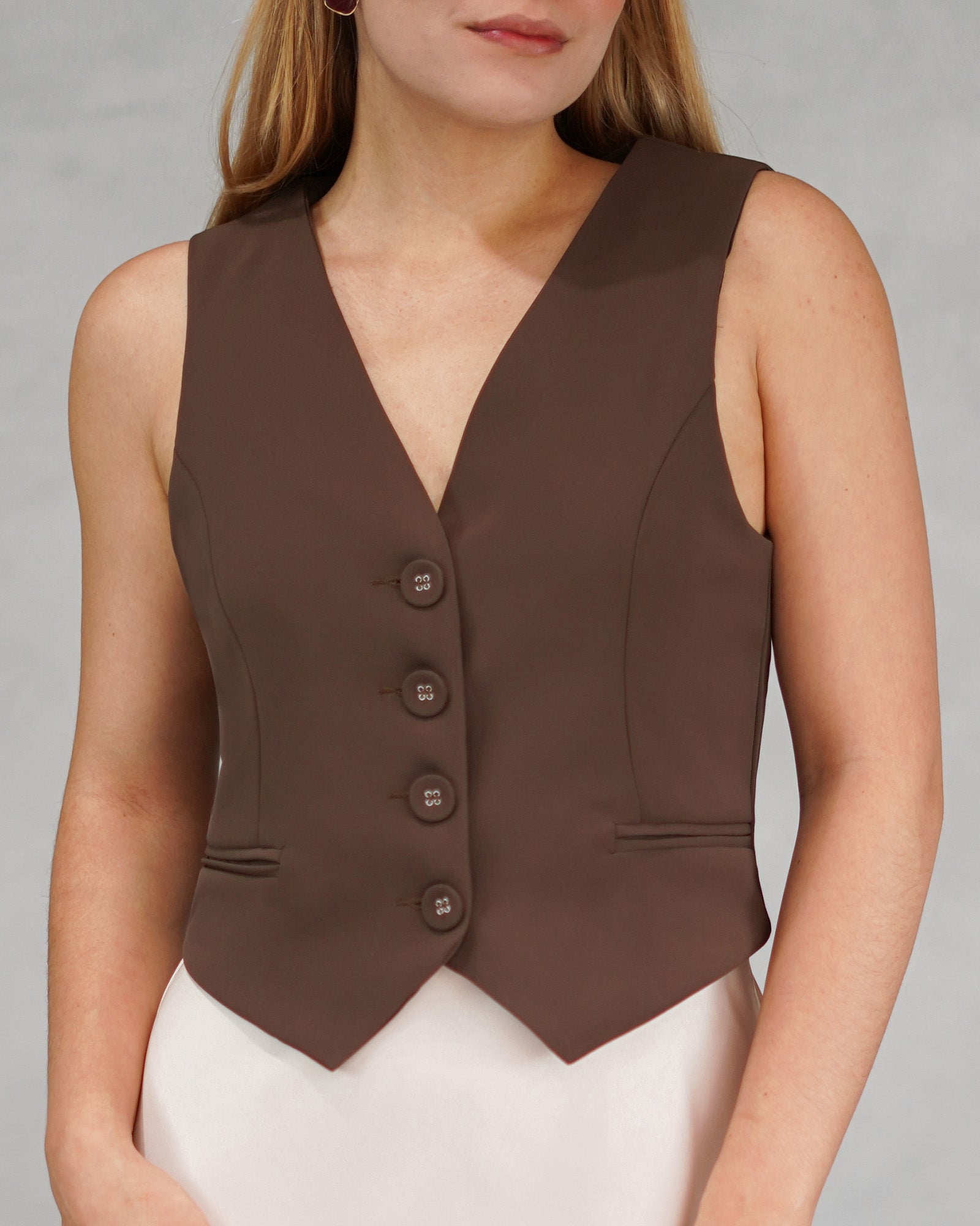 Chaleco con botones de tela