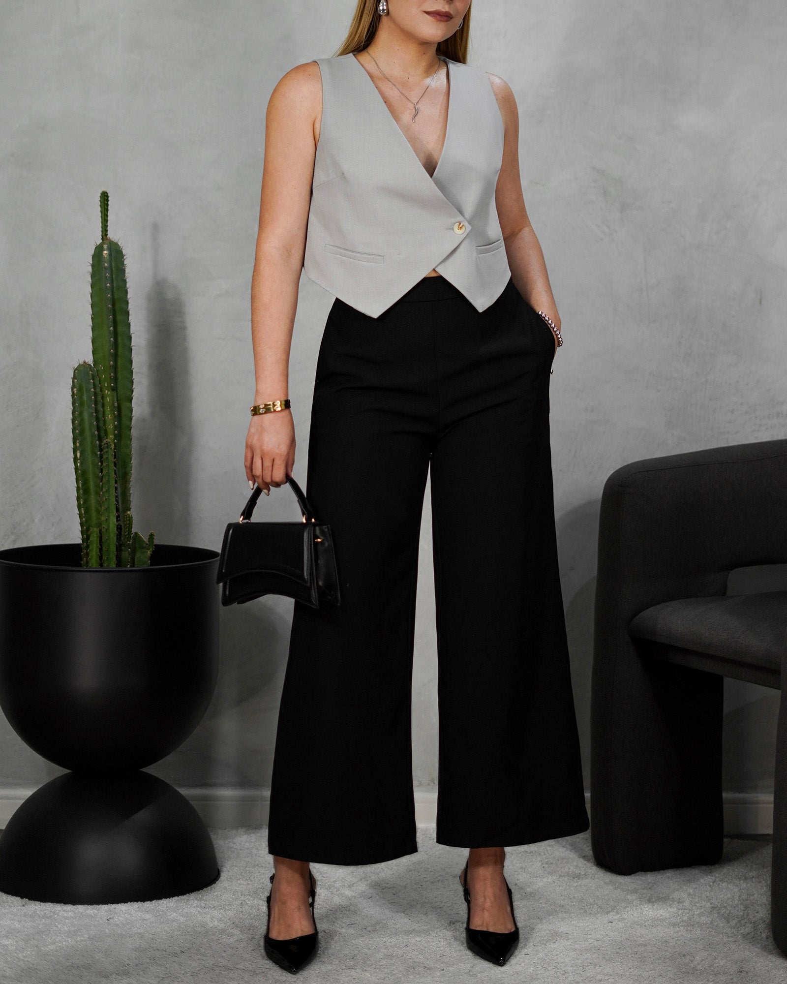 Chaleco cruzado corto de un botón