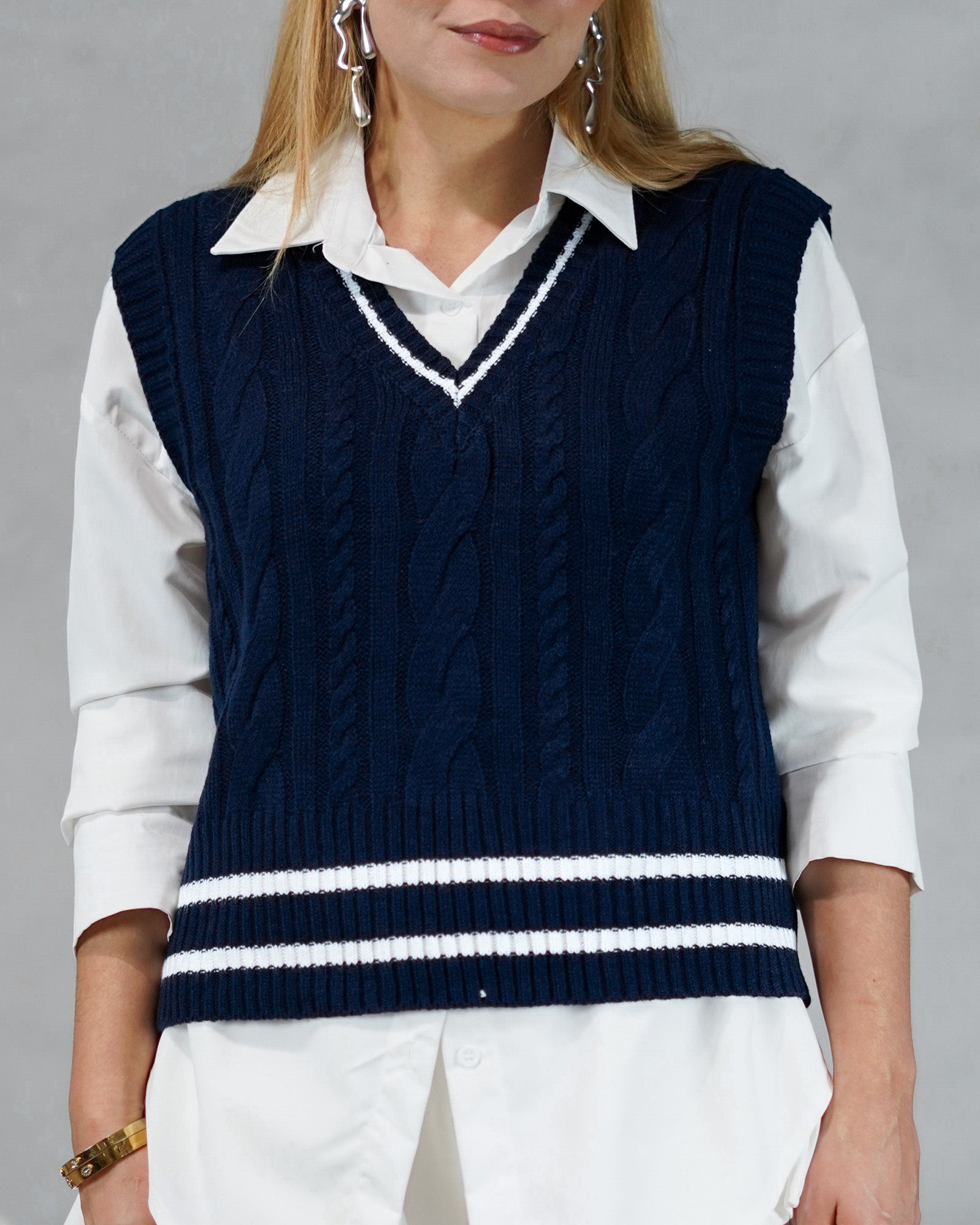 Chaleco tejido sin mangas con líneas