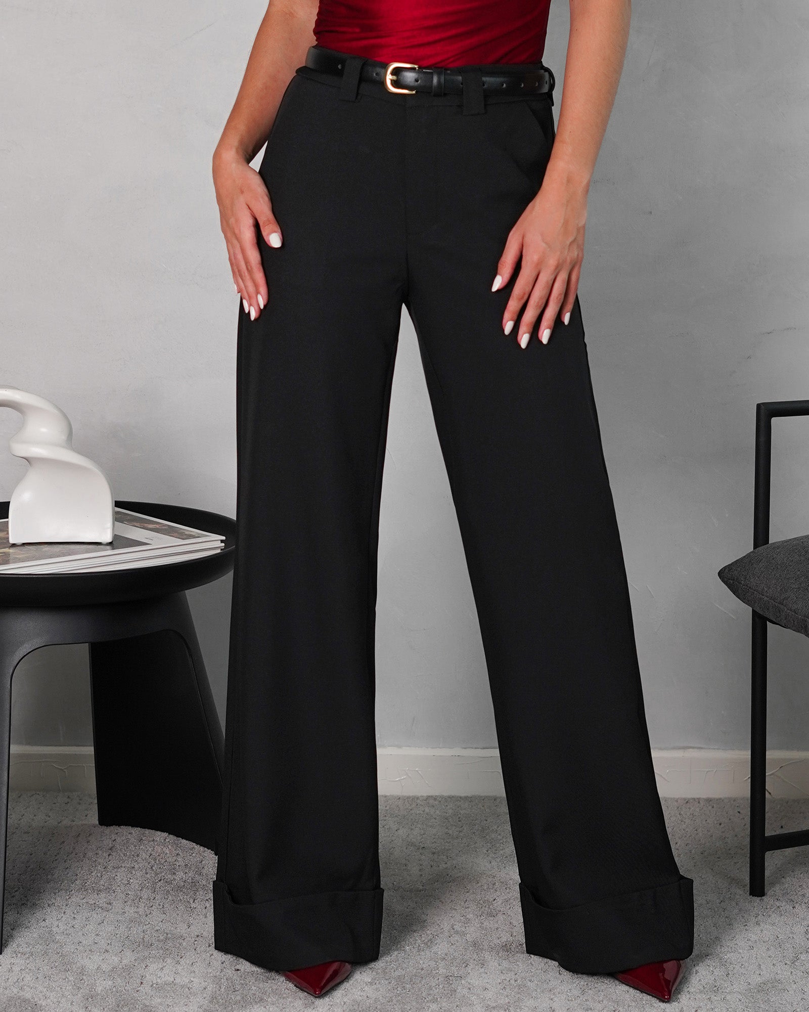 Pantalón ancho a la cadera con ruedo