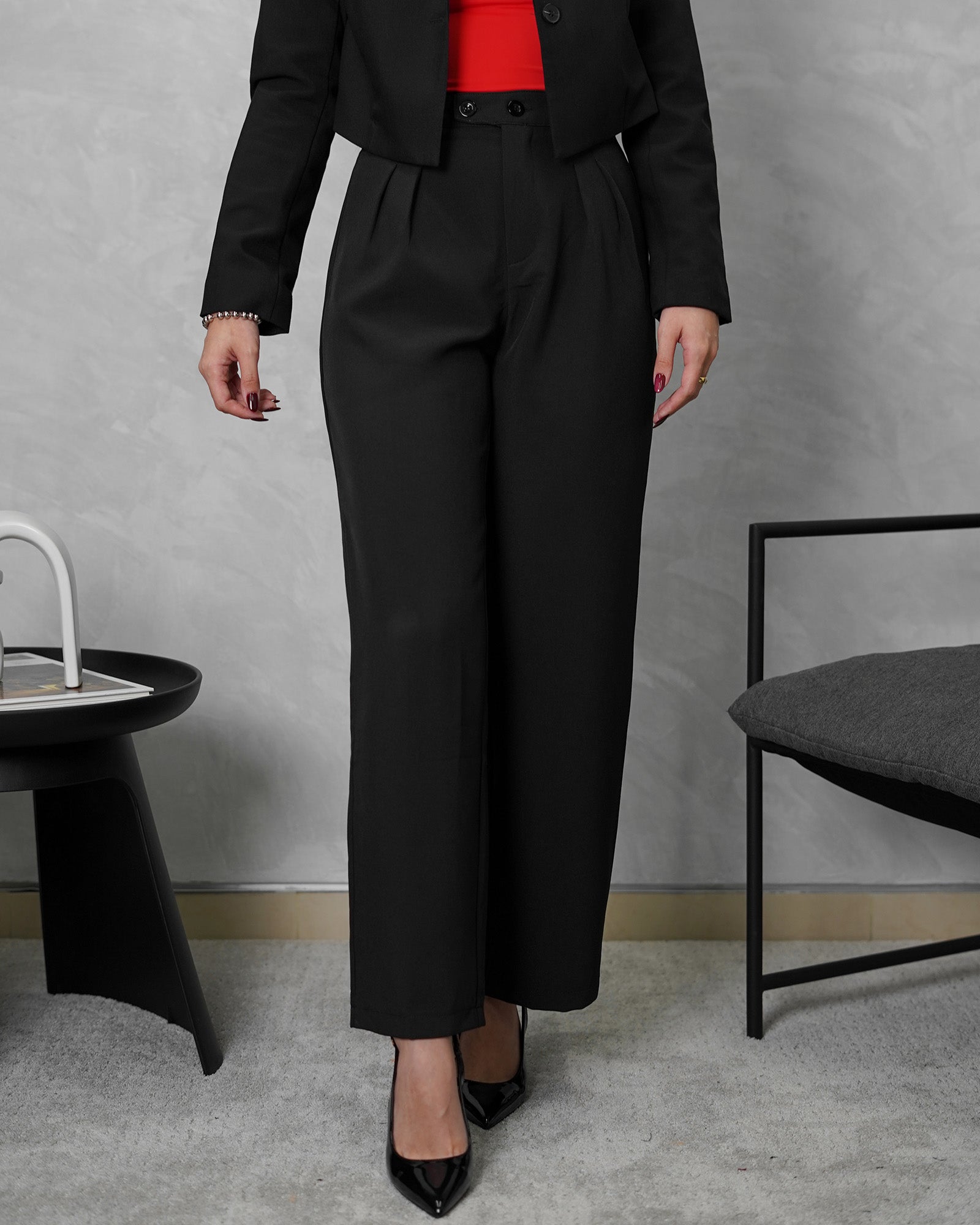 Pantalón recto de dos botones horizontales