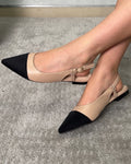 Stilettos tacón bajo con puntera negra