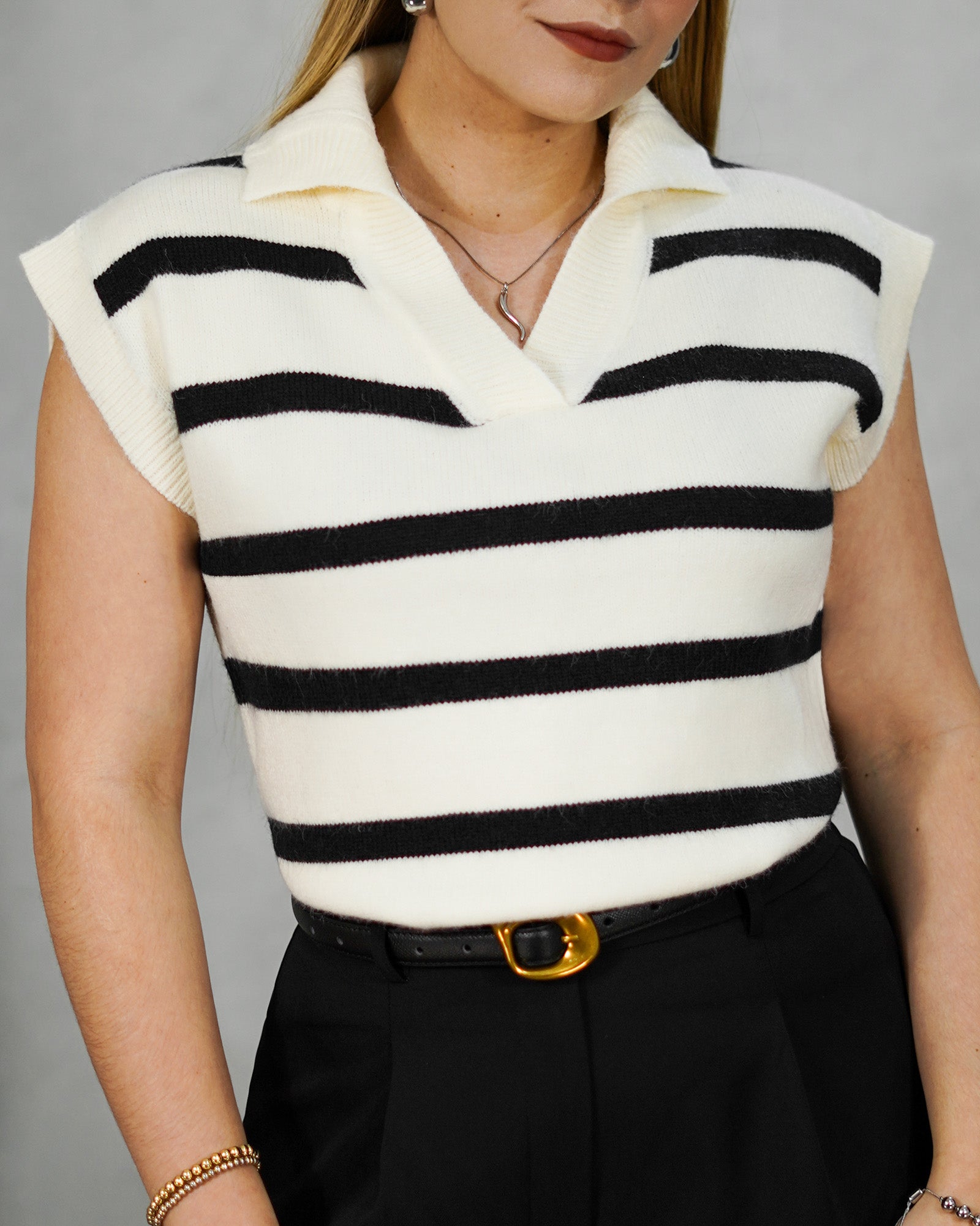Sweater sin mangas de rayas