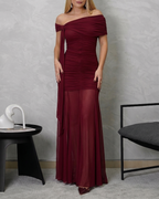 Vestido largo de un hombro con transparencia abajo